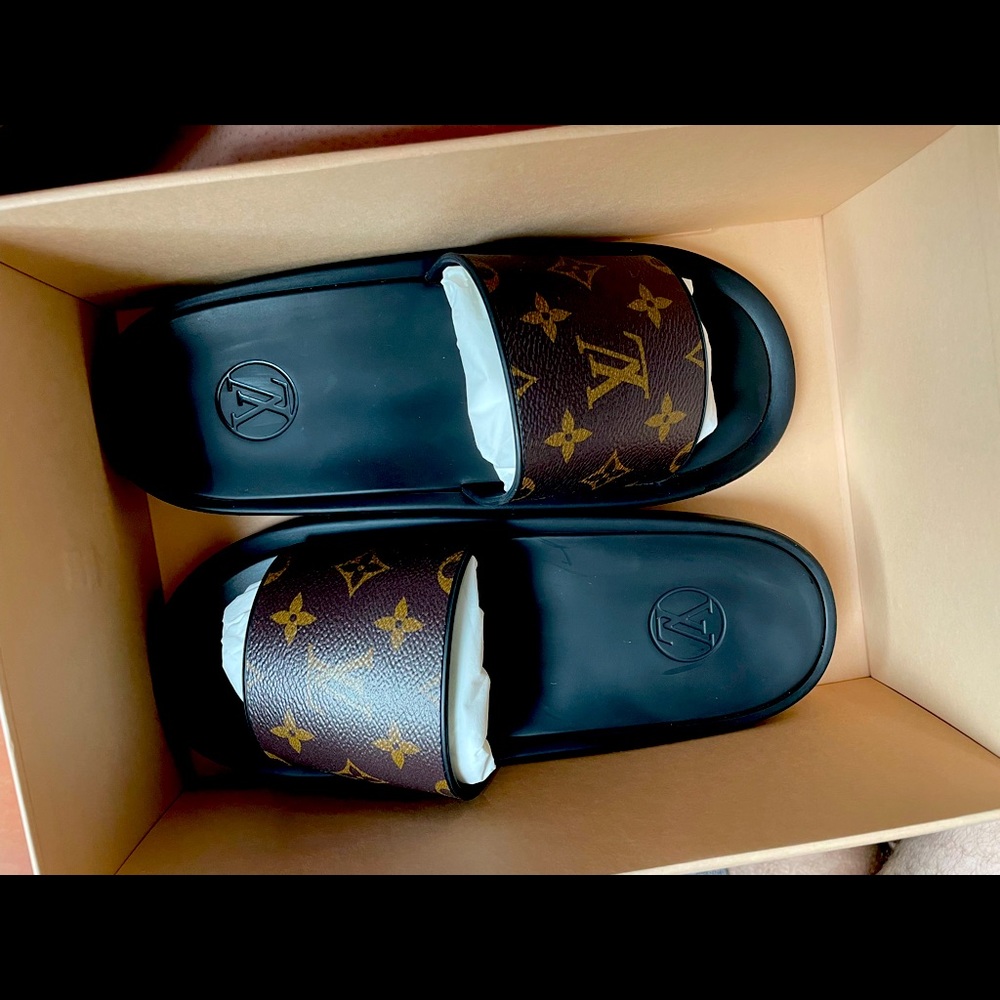 Louis Vuitton slides.